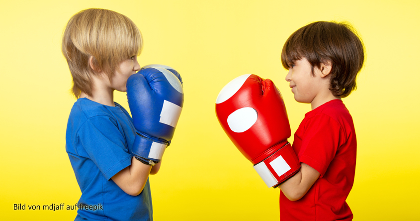 Kinder mit Boxhandschuhen