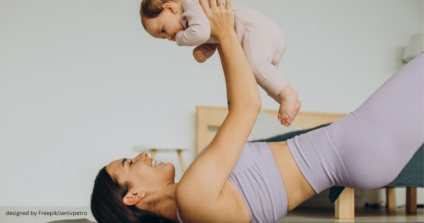 Mama mit Baby macht Yoga