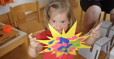 Kind mit Stern in der Hand