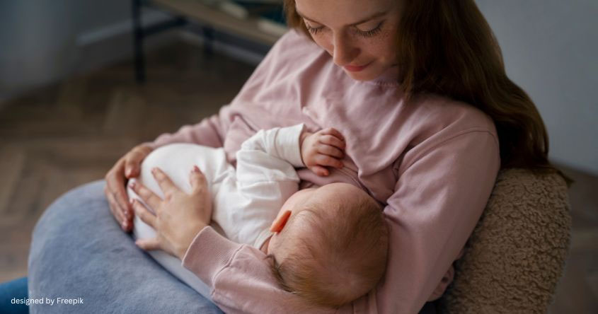 Mama mit Kind an der Brust